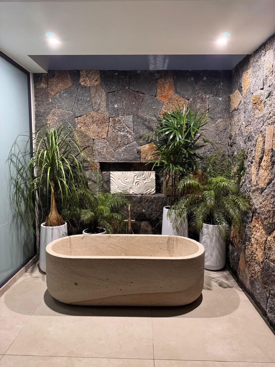 Volcanic stone bathroom wall