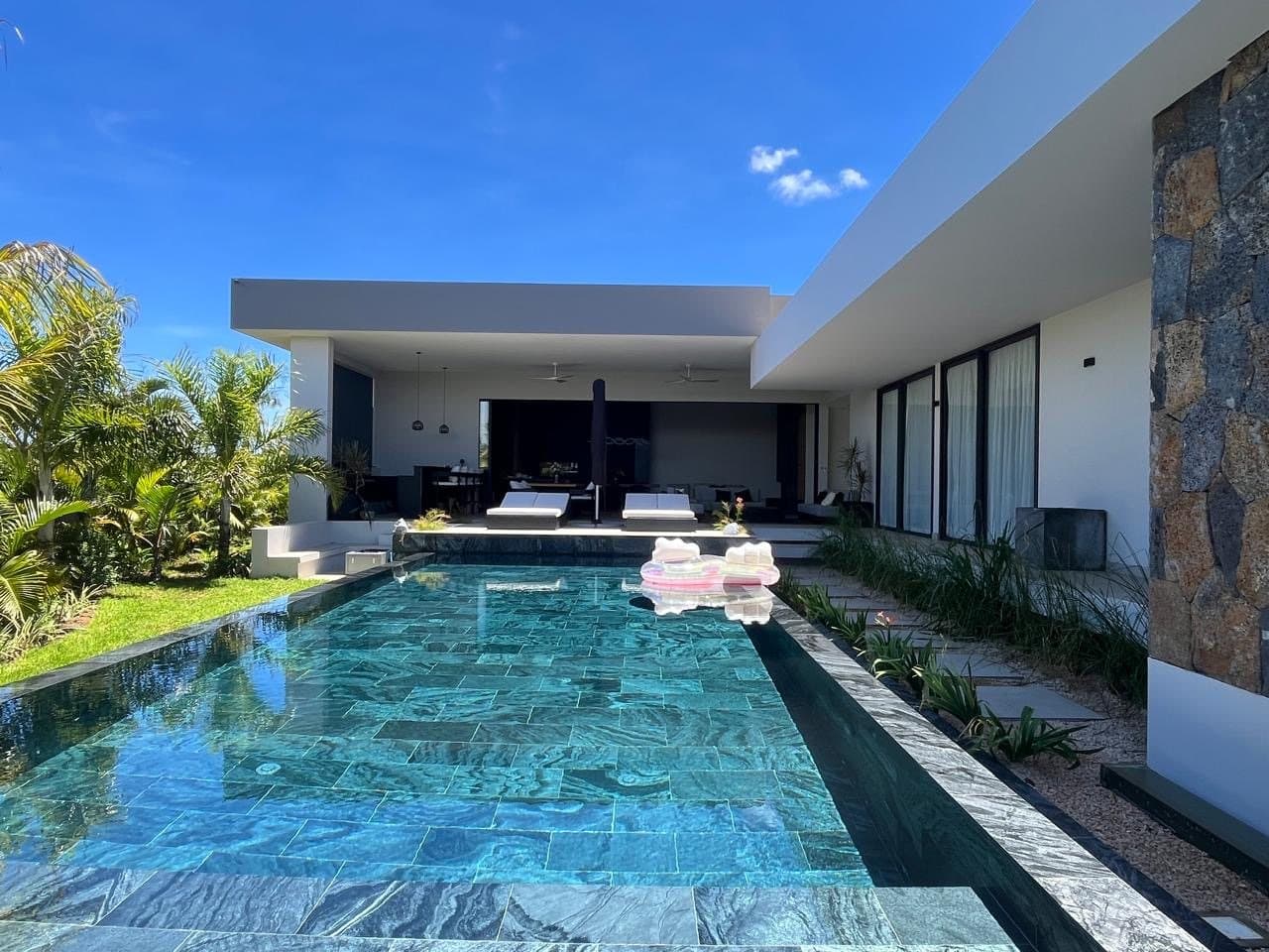 Green marble pool along the bedroom wing
