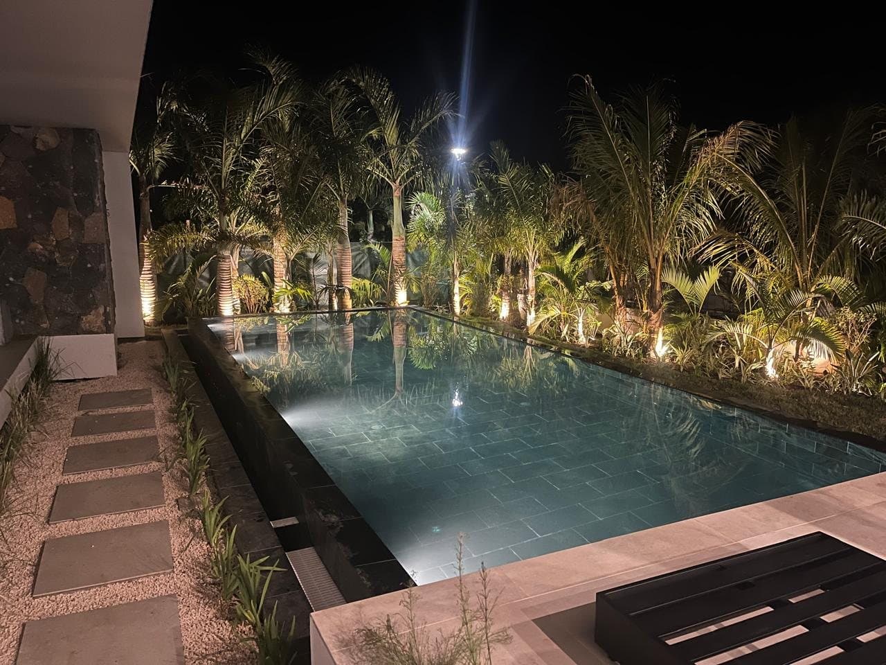 Pool at night seen from the sun deck